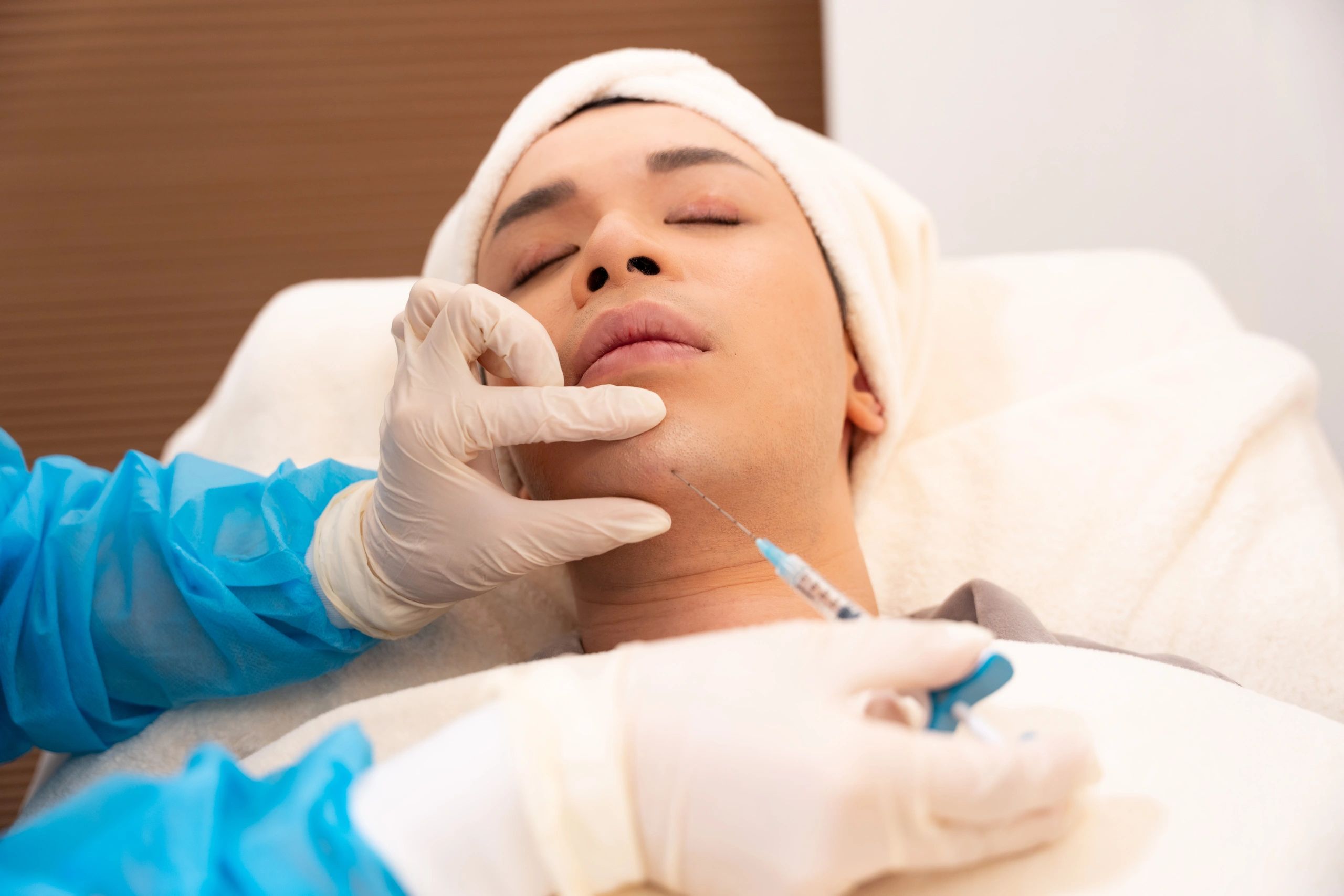 Aesthetic injectable treatment being performed in a clinic
